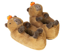 Load image into Gallery viewer, Pair of plush capybara slippers made with brown plush, webbed feet, embroidered eyes and nostrils, little ears, and a yuzu fruit on each head.
