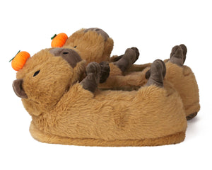 Pair of plush capybara slippers side view